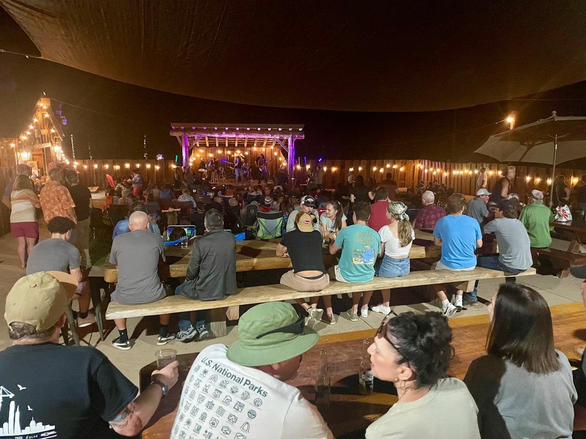 A band playing the outdoor stage behind the Lube Room