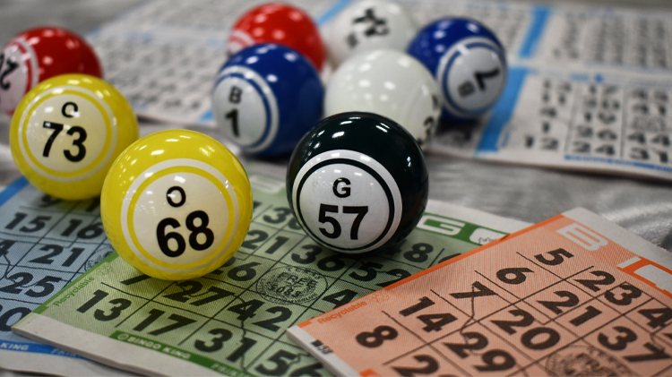 Bingo cards and colorful numbered balls; illustrative activity photo
